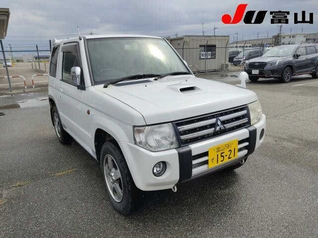 7529 Mitsubishi Pajero mini H58A 2011 г. (JU Toyama)